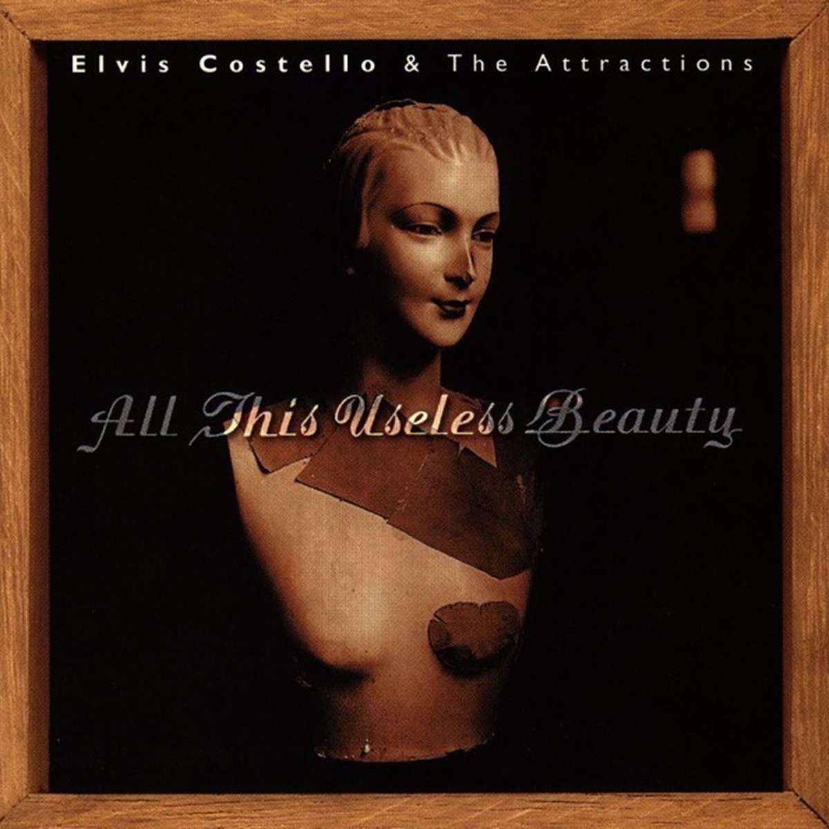 All This Useless Beauty by Elvis Costello album cover