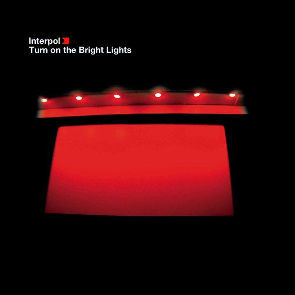Turn On the Bright Lights by Interpol album cover
