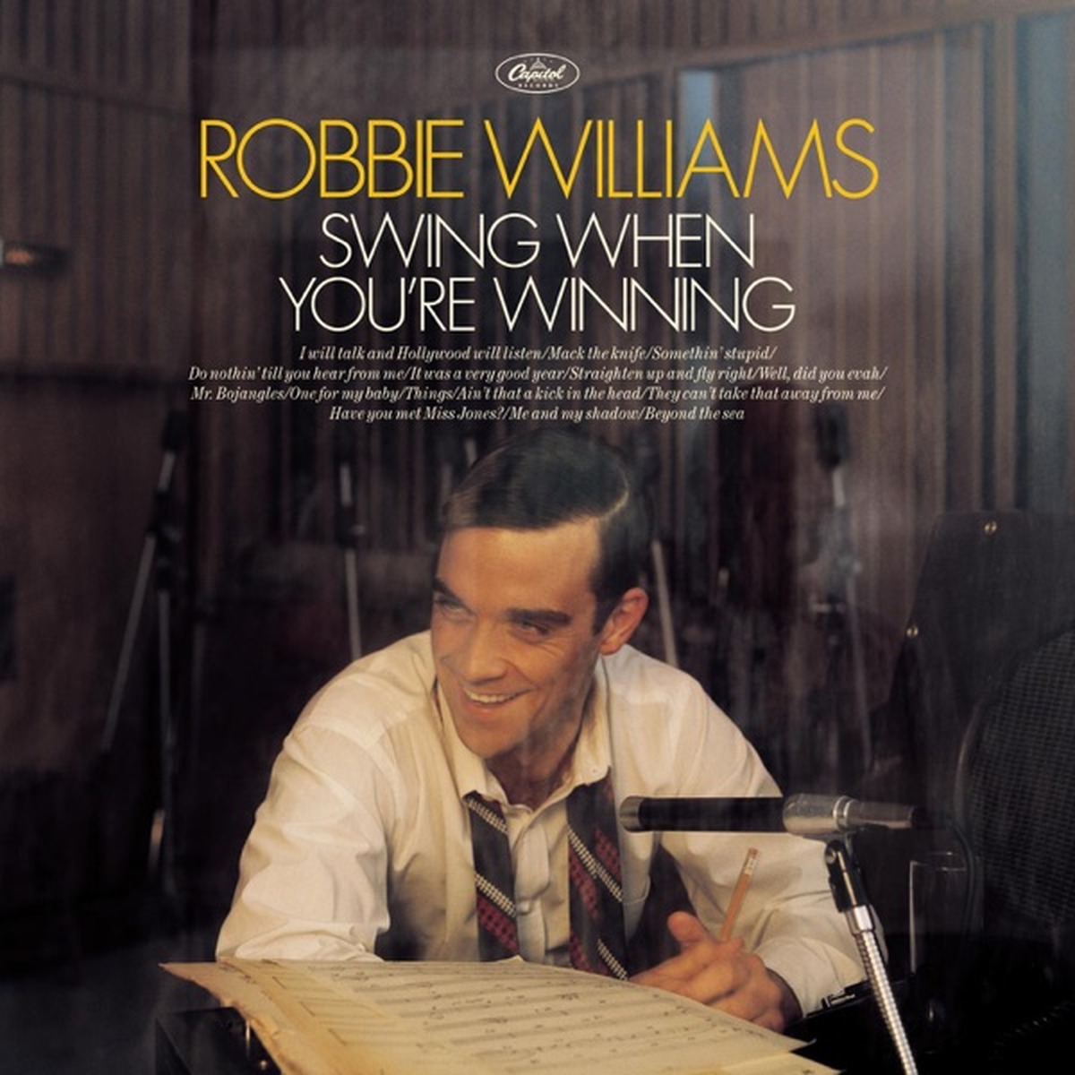Swings Both Ways by Robbie Williams album cover