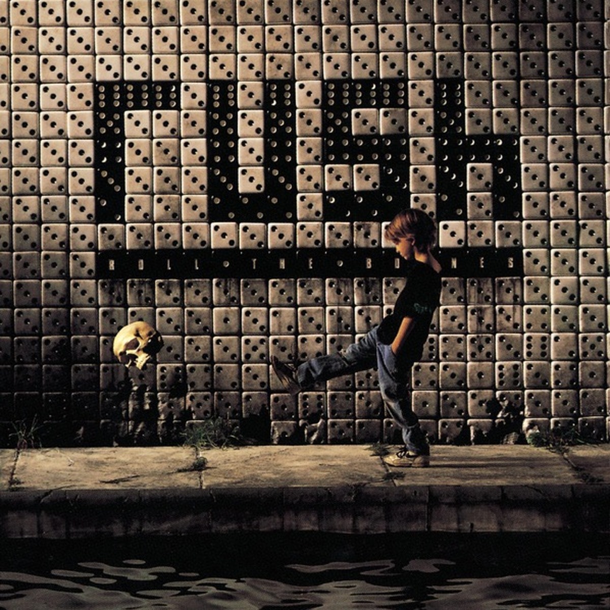 Roll the Bones by Rush album cover
