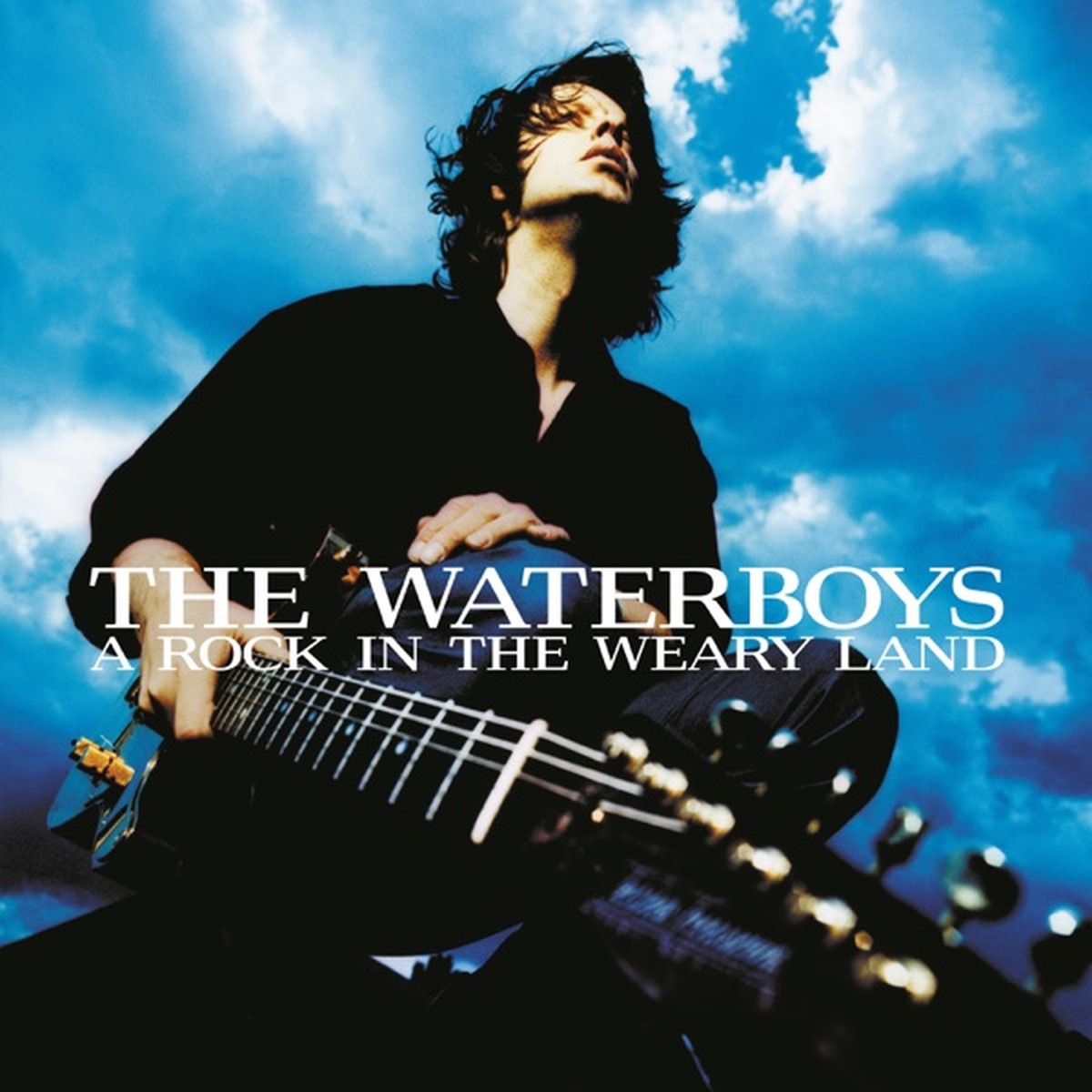 A Rock in the Weary Land by The Waterboys album cover