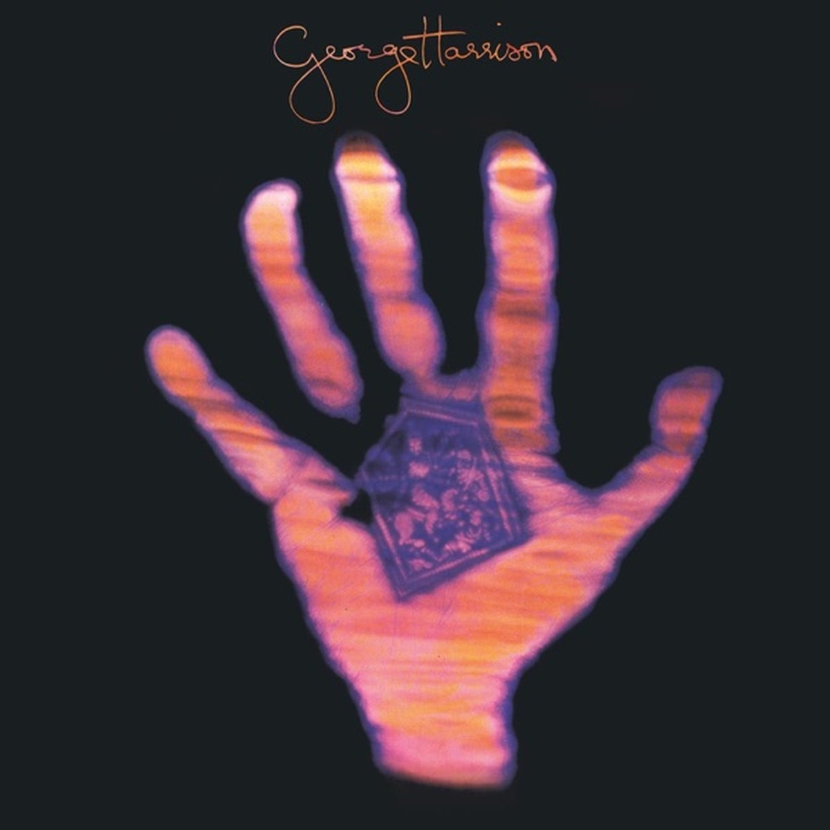 Living in the Material World by George Harrison album cover