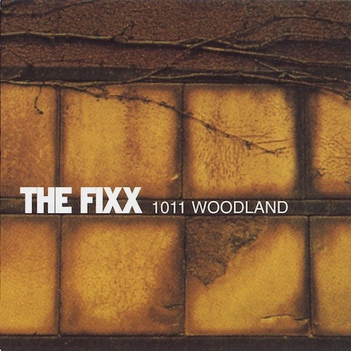 1011 Woodland by The Fixx album cover